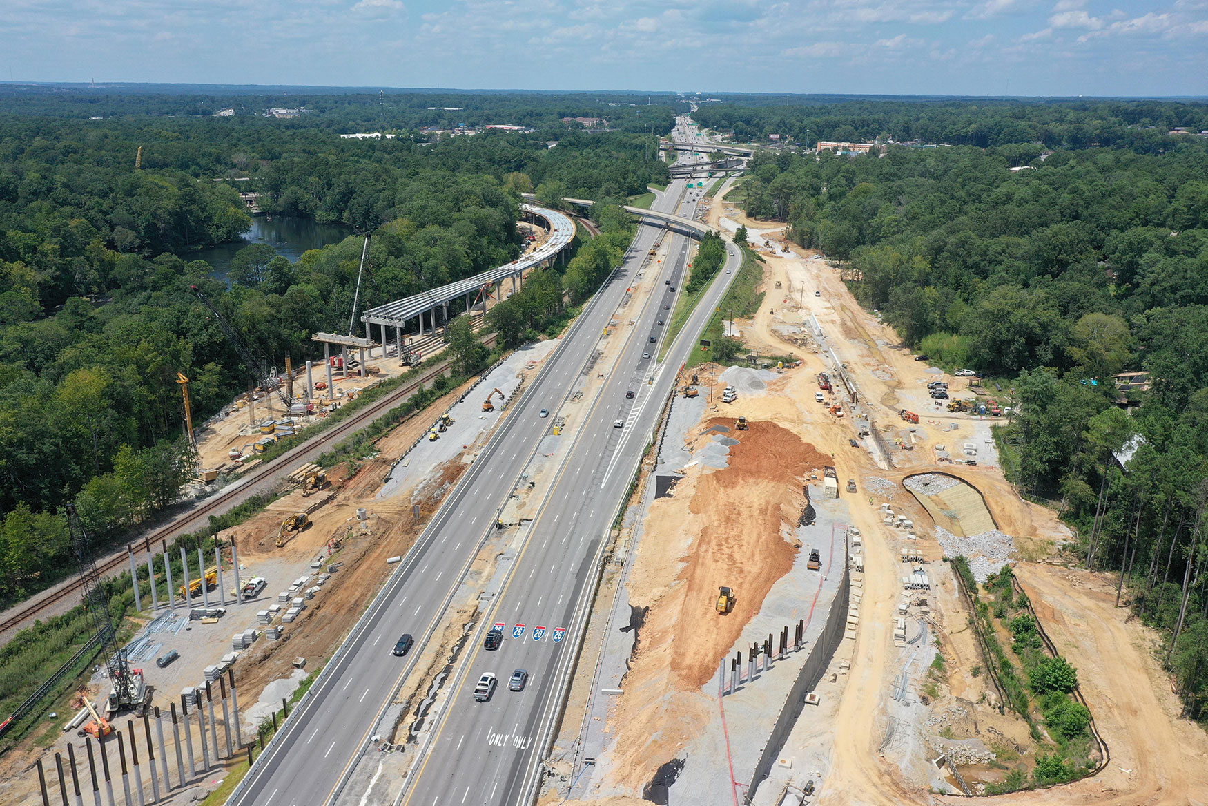 Active bridge, MSE wall, and fill construction along I-126 for Phase 1.