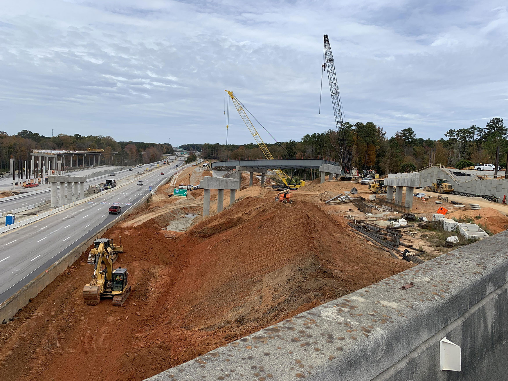 November 2023, various construction projects are underway along I-126. Looking west toward Spartanburg three new bridges are being built that will have on-and-off-ramps that will connect Colonial Life Boulevard and Bush River and Colonial Life Boulevard and I-26/I-126.