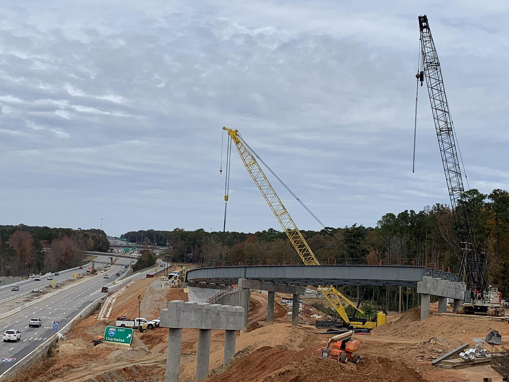 November 2023, looking down I-126 toward Spartanburg. Caps for Bridge 36 and steel girders for Bridge 34 can be seen.