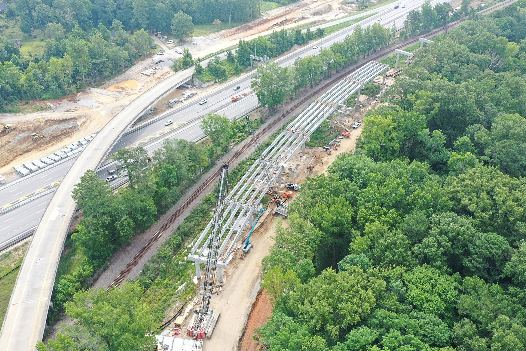 Aerial view of Bridge 35 from Bent 19 to 25. Bents are vertical support structures used in bridge construction that provide stability and support for the weight of the bridge's superstructure.