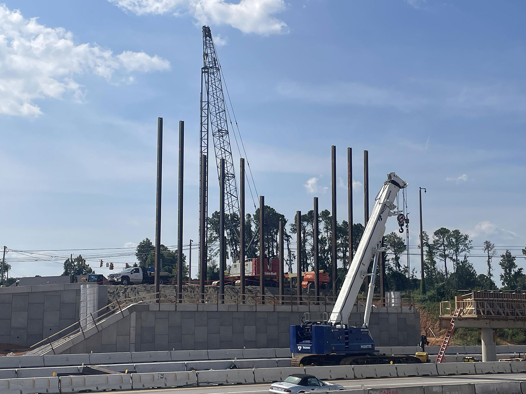 The retaining walls for the bridge along Broad River Road were completed in September 2023. This allowed crews to work on supports for the new bridge that will cross over I-20.