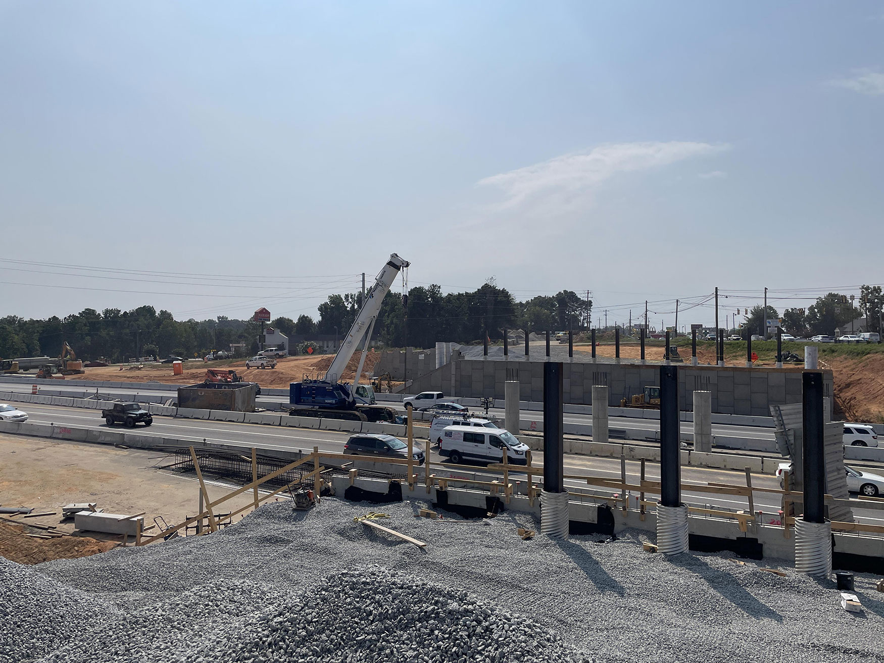 The early stages of construction for a bridge over I-20. This bridge will allow motorists to travel from location to location. 