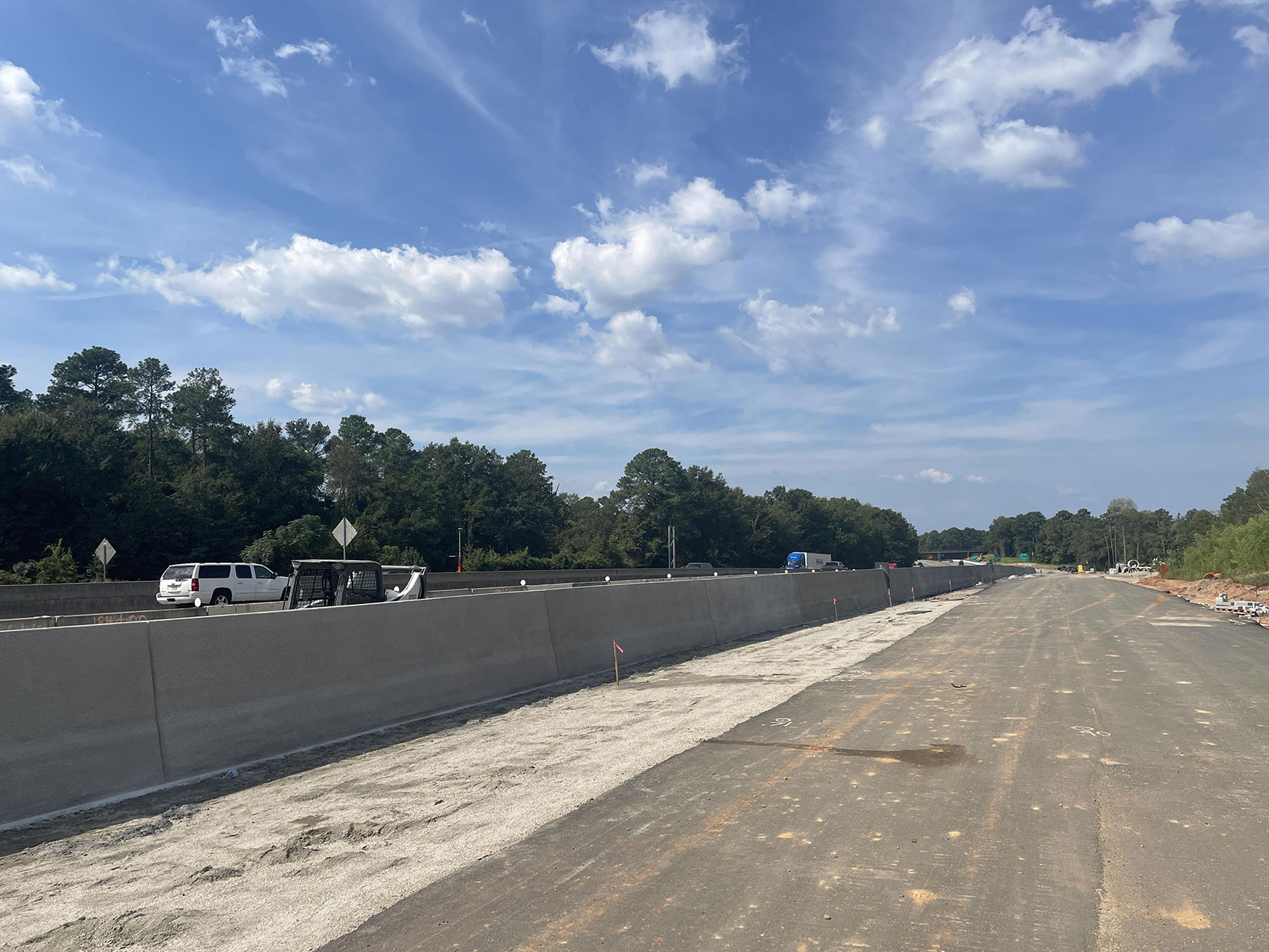 Barrier walls have been added to some segments of the roadway along I-20. This has created collector-distributor ramps that enhance safety for drivers entering and exiting the area.